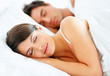 Beautiful young lady sleeping with husband on bed Beautiful young lady sleeping with husband on bed