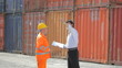 Manual worker, businessman and cargo containers