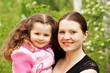 Mother and the daughter on nature