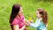 Mother and the daughter on nature