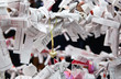 Japanese paper omikuji fortunes and a heart charm