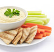 Hummus with pita bread and vegetables