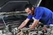 Auto mechanic working on car engine - a series of MECHANIC Auto mechanic working on car engine - a series of MECHANIC