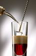 Pour liquid layer into a long drink glass. Pour liquid layer into a long drink glass.