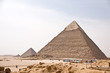 Ancient Egyptian pyramid of Giza against blue sky