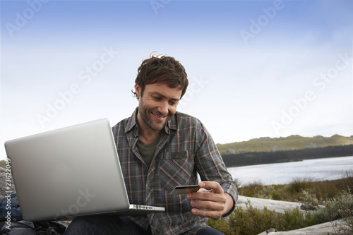 Photo: Tourist with a computer Tourist with a computer