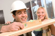 Happy couple working