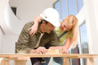 Couple doing home decoration