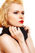 Beautiful woman with blond hair, red lips and black scarf