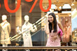 girl in shop calls by phone girl in shop calls by phone
