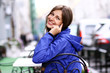 Happy young lady talking on mobile phone Happy young lady talking on mobile phone