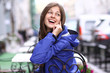 Happy young lady talking on mobile phone Happy young lady talking on mobile phone