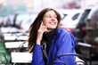 Happy young lady talking on mobile phone Happy young lady talking on mobile phone