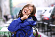 Happy young lady talking on mobile phone Happy young lady talking on mobile phone
