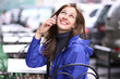 Happy young lady talking on mobile phone Happy young lady talking on mobile phone