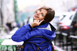 Happy young lady talking on mobile phone Happy young lady talking on mobile phone