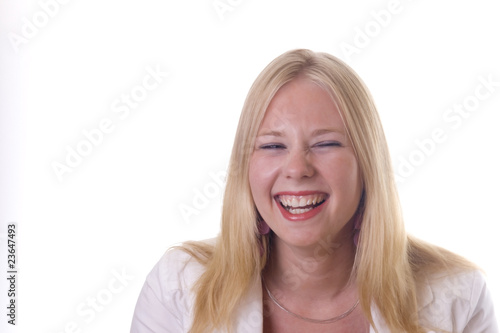 Photo: Blonde girl laughing out loud Blonde girl laughing out loud