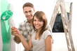 Couple painting their home