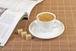 Cup of coffee and a magazine