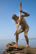 Primeval man catches a fish