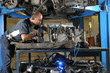 Auto mechanics working under the car - a series of MECHANIC Auto mechanics working under the car - a series of MECHANIC