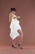 Beautiful flamenco dancer in white dress