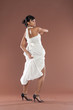 Beautiful flamenco dancer in white dress