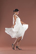 Beautiful flamenco dancer in white dress