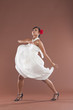 Beautiful flamenco dancer in white dress