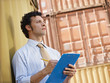business man with shipping containers