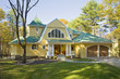 Yellow House with Green Roof