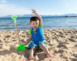 boy having fan on the beach