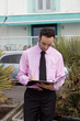 Professional young man working outside