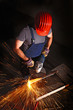 worker with grinder