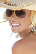 Sexy Blond Girl In Aviator Sunglasses and Straw Cowboy Hat