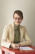 Smiling business woman ready to sign contract