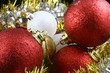 Detail of christmas balls and stars on white background