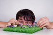 Boy picking flowers. Boy picking flowers.