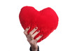 Photo: beautiful woman holding a love symbol in hands beautiful woman holding a love symbol in hands