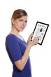 Woman holding a touchpad pc, reading a newspaper