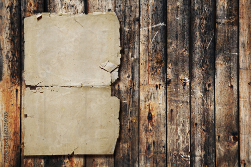 Photo: paper on old wood texture paper on old wood texture