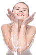 Close-up of beautiful woman washing her face Close-up of beautiful woman washing her face