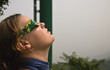 Woman watching Solar Eclipse in China, July 22nd 2009.