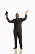 A Man Wearing A Clerical Collar And Holding His Bible