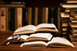 opened book, lying on the bookshelf