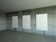 Three empty boards in room with grunge walls