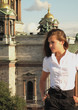 Young woman on a background of St. Isaak Cathedral