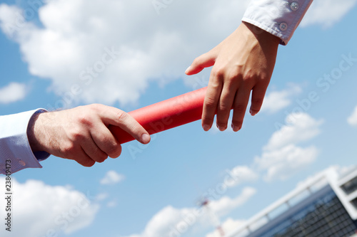Photo: Passing baton Passing baton