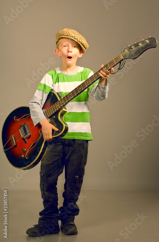 Photo: The boy with a guitar The boy with a guitar