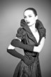 Beautiful fashion girl on the grey background Beautiful fashion girl on the grey background